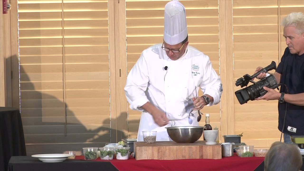 Live cooking demonstration at food exhibition