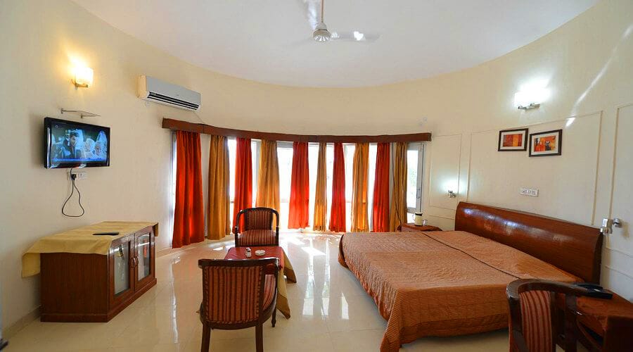 Couple or premium stay package near Badkhal Lake