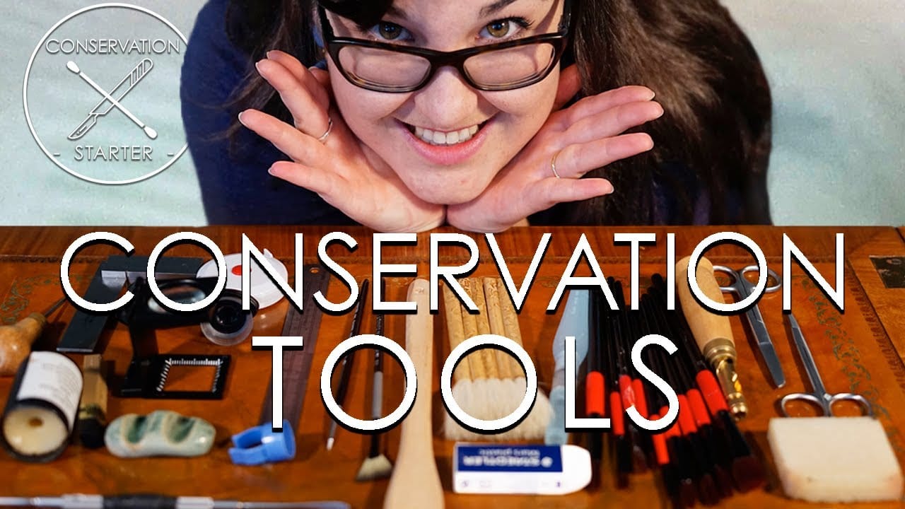 Professional art conservation tools and cleaning supplies laid out showing proper materials for skateboard art care